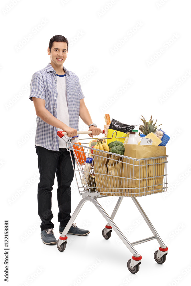 Sticker Man with a shopping cart and looking at the camera