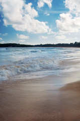 Snow-white foam of the surf. Beach Atlantic Ocean. Dominican Republic.