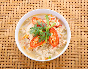 Simmer eggs of Thailand in bowl on bamboo background