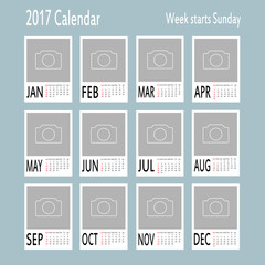 Vector template of 2017 calendar with place for photo.