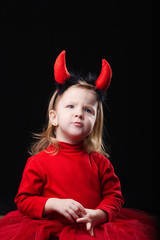 little devil on dark background