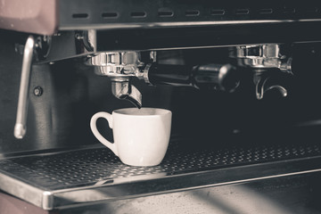 cup of coffee with professional coffee machine  retro color