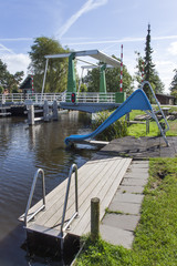 Slide and natural swimming pool