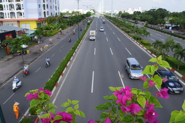 city street with many vehicle in vietnam