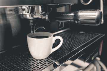 cup of coffee with professional coffee machine  retro color