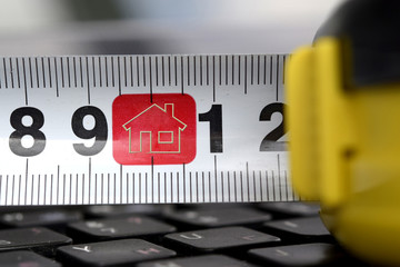 The line on the keyboard with the sign real estate
