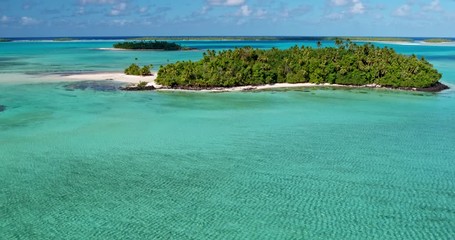 Aerial view of beautiful tropical island lagoon and white sand beach in the South Pacific - Powered by Adobe