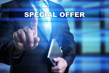 Businessman is pressing button on touch screen interface and selecting "Special offer". Business concept.
