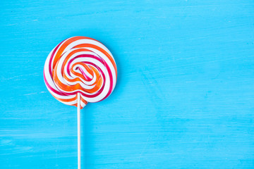 lollipop candy on a turquoise bacground