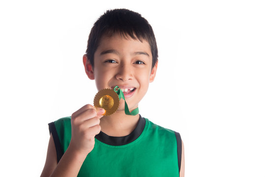 Little boy get gold medal the winner first plact after sport competition