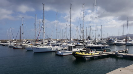 Obraz premium Beautiful coast and harbor of the the Canary Island of Lanzarote
