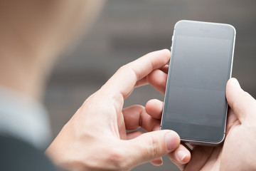 Businessman using mobile smartphone