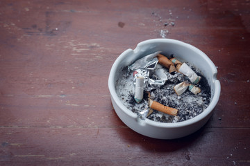 cigarette stub in ashtray, image no smoking concept background