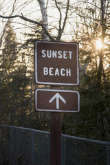 Sign board of Sunset Beach, Hecla Grindstone Provincial Park, Ma