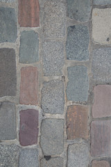 Grey and red brick stone street sidewalk,