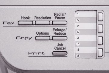 Closeup surface function of old photocopier and fax machine in the office textured background in black and white tone