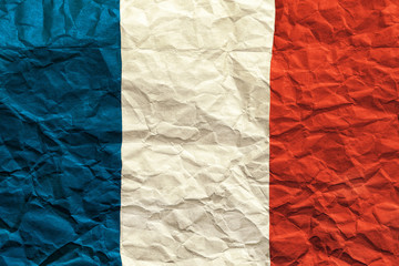 France flag. Crumpled paper flag background