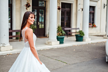 Naklejka premium Happy bride with closed eyes smiling