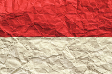 Monaco flag. Crumpled paper flag background