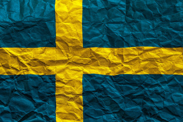 Sweden flag. Crumpled paper flag background