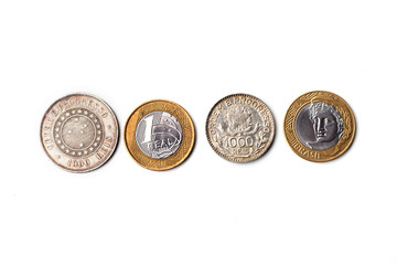 Old coins of Brazil isolated over white background