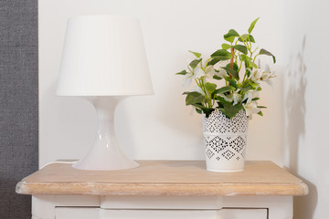 Nightstand with Lamp and Plant