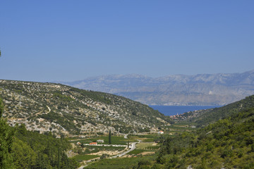 Fototapeta premium View over the 2 km deep valley from the little village Dol to Postira, picture from Island Brac in Croatia.