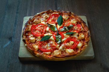 Pizza on wood table.