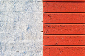 Painted wall and red wood texture