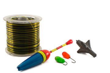 Рыболовецкие снасти на белом фоне.