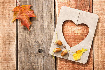 Autumn background with frame heart shaped
