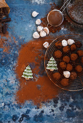 Truffles chocolate, powder sugar dried figs and gingerbread cookies 