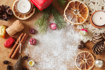 Christmas fir tree with decoration on dark wooden board