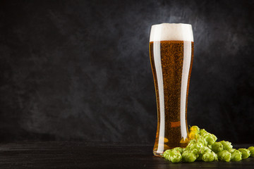 Beer glass on dark background