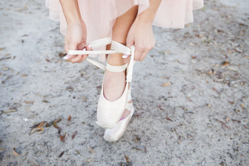 Girl Tying Ballet Slippers © Susan McManus Ellis