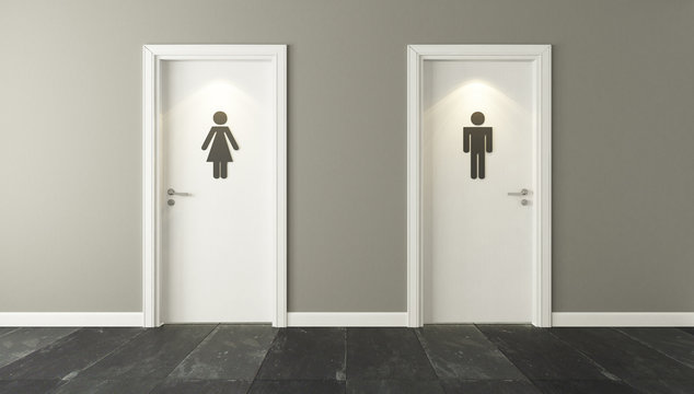 white restroom doors for male and female genders with spot light