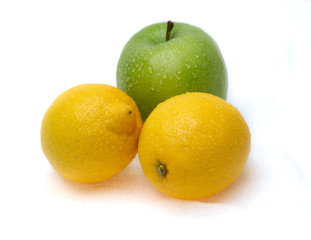 Two lemons and green apple