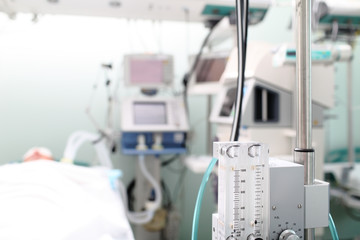 Gas medical equipment (gas mixer and rotameter) against the back