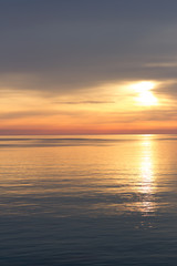 Seascape at sunset. Dead calm