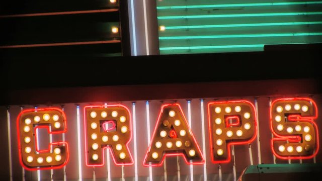 A neon sign saying CRAPS in Las Vegas.