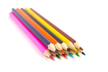 colored pencils on white background
