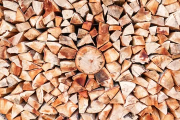 Wall murals Firewood texture Stacked firewood background texture