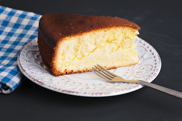 piece of cake on a black stone surface