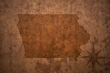 iowa state map on a old vintage crack paper background