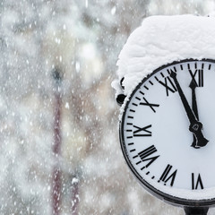 Clock with snow