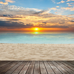 Fototapeta na wymiar sand of beach and sunset sky and wood floor