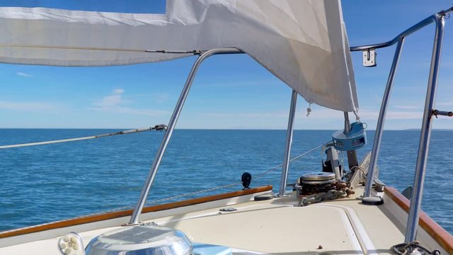 4K Close Up View of Sailboat Bow, Beautiful Blue Water Horizon, Boat Cruising