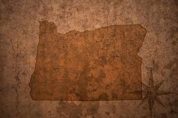 oregon state map on a old vintage crack paper background