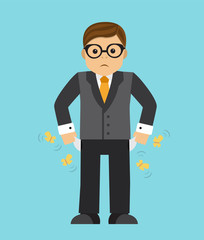 Sad businessman sitting by removing empty pockets