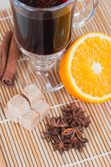 Obraz na płótnie Canvas Ingredients for mulled wine: glass orange cinnamon star anise Th